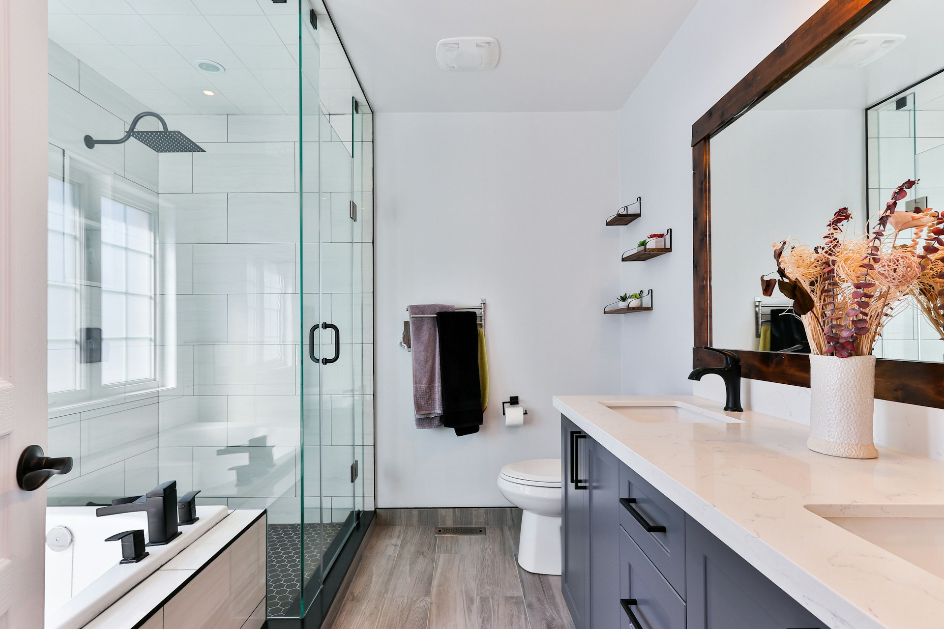 Chicago bathroom remodeling project mid-renovation with tile installation underway by AAA Construction Services